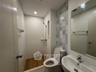 Modern bathroom with sleek fixtures and stylish tile accents