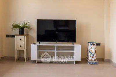 Modern living room with sleek TV stand and stylish decor