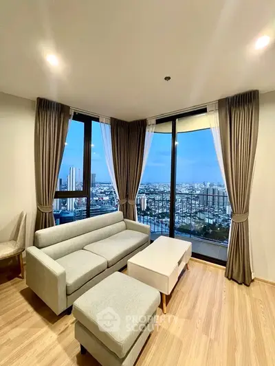 Stunning corner unit living room with panoramic city view and modern furnishings.