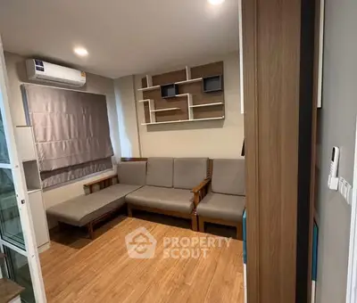 Modern living room with stylish shelving and cozy seating area