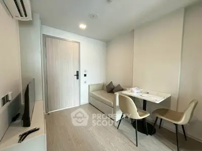 Modern minimalist living room with sleek furniture and neutral tones