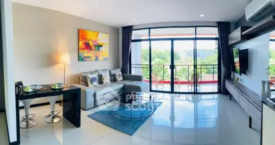 Spacious modern living room with large windows and balcony view
