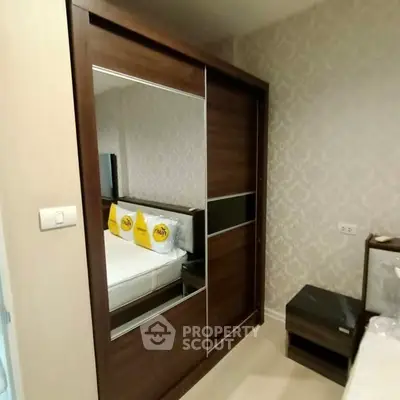 Modern bedroom with stylish wardrobe and elegant decor