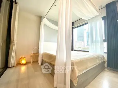Luxurious bedroom with canopy bed and city view, perfect for urban living.