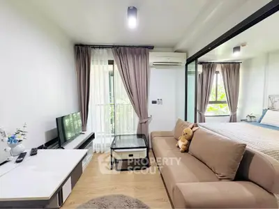 Modern living room with cozy sofa and natural light in stylish apartment