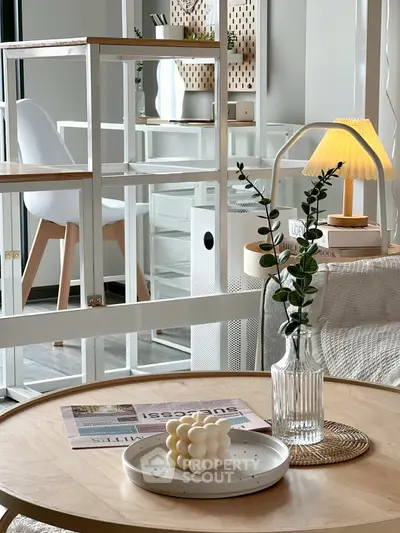 Stylish modern living room with elegant decor and natural light.