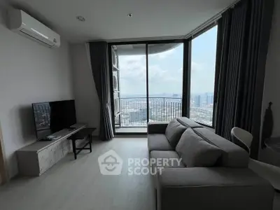 Modern living room with panoramic city view and stylish furnishings