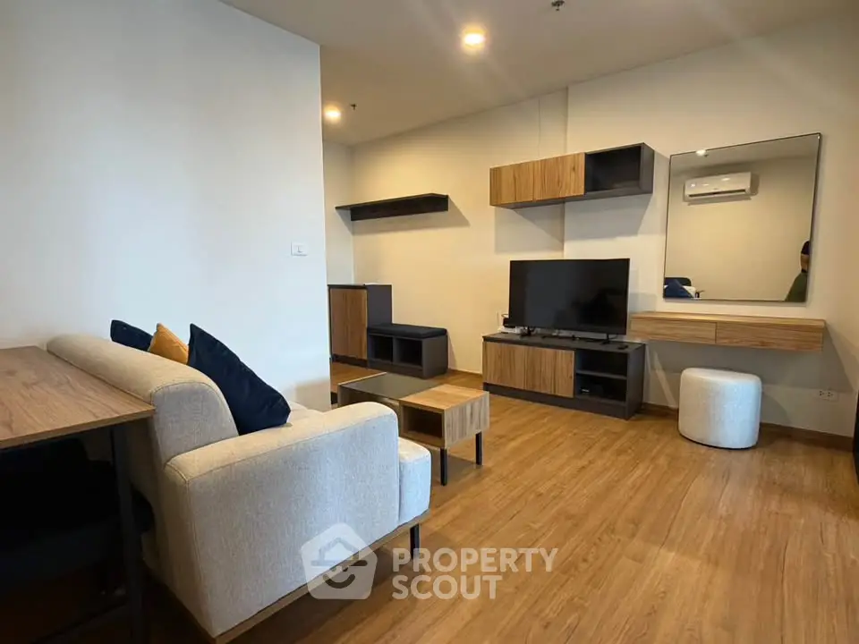 Modern living room with stylish wooden furniture and cozy seating area