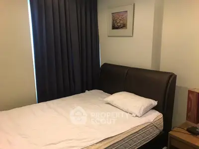 Cozy bedroom with elegant dark curtains and stylish headboard