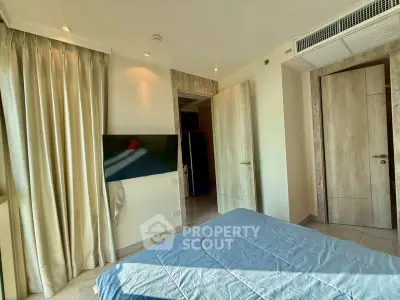 Modern bedroom with natural light and stylish decor