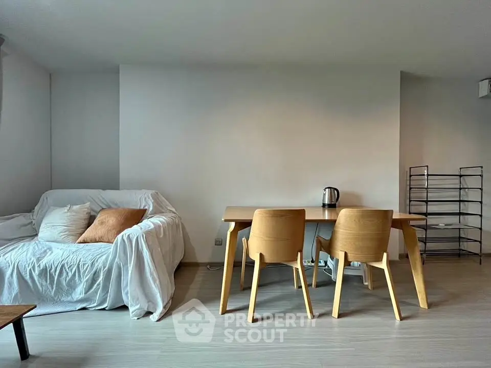 Modern living room with minimalist furniture and natural light