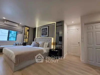 Luxurious modern bedroom with elegant decor and ambient lighting, perfect for relaxation and comfort.