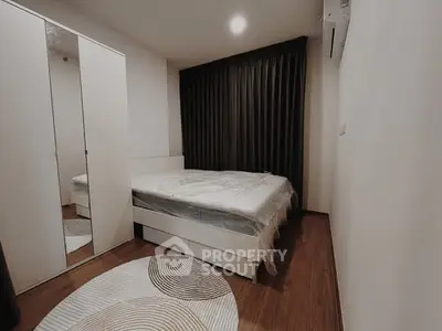 Modern bedroom with stylish decor and cozy ambiance