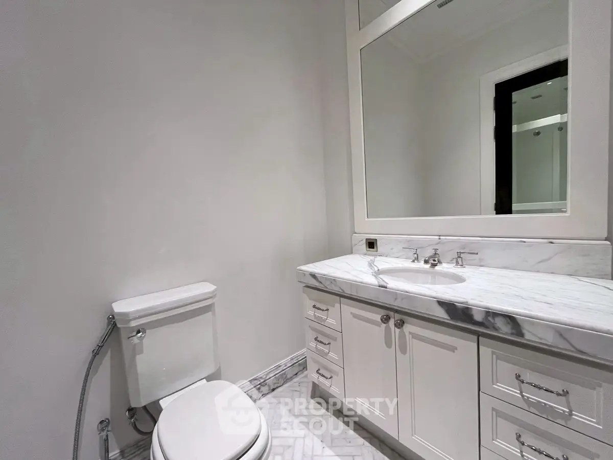 Elegant bathroom with marble countertop and modern fixtures