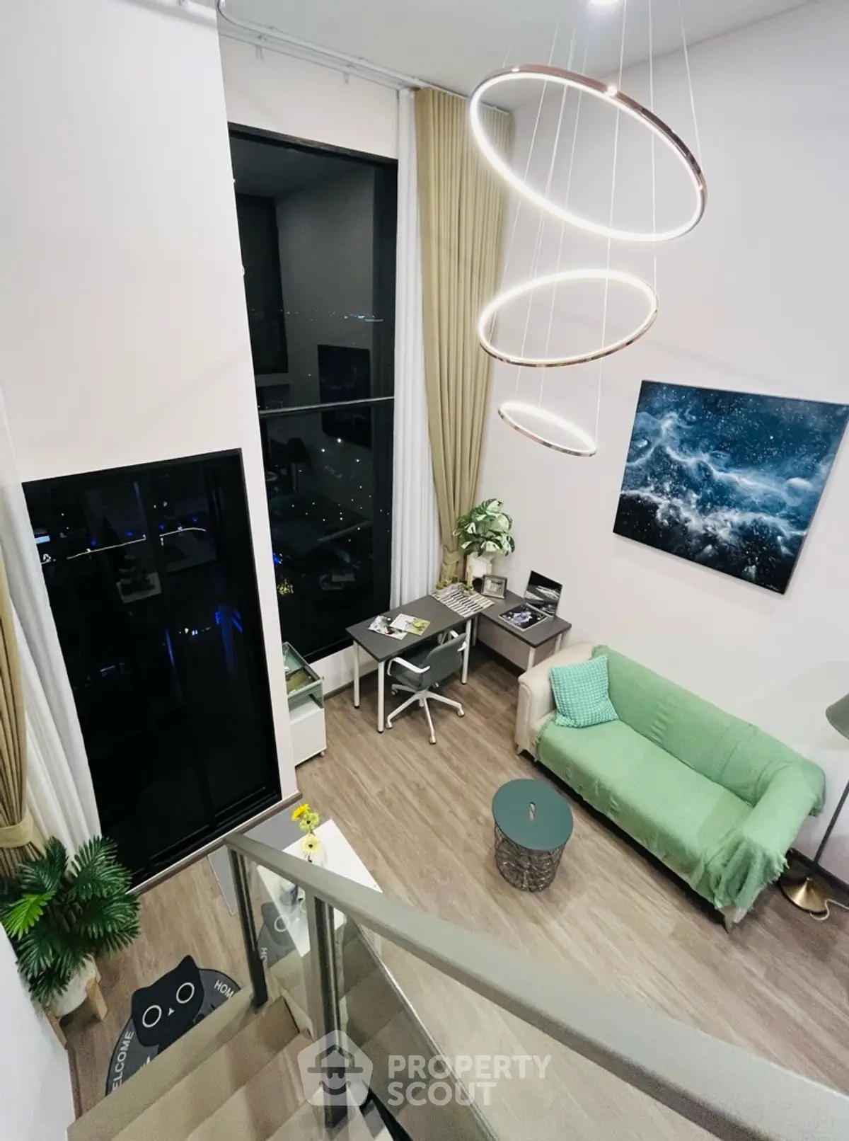 Modern loft living room with high ceiling and stylish decor