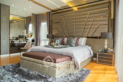Luxurious bedroom with elegant decor and plush bedding in modern home