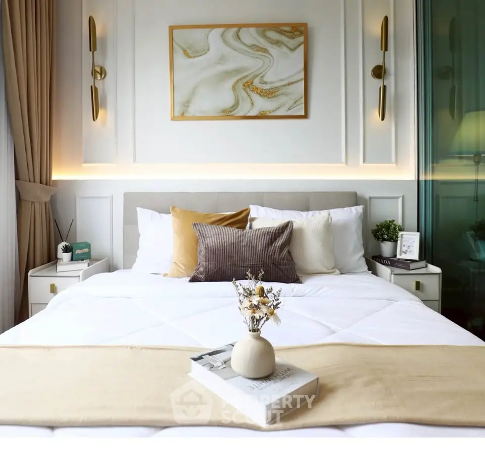 Luxurious bedroom with elegant decor and cozy ambiance, featuring stylish lighting and modern furnishings.