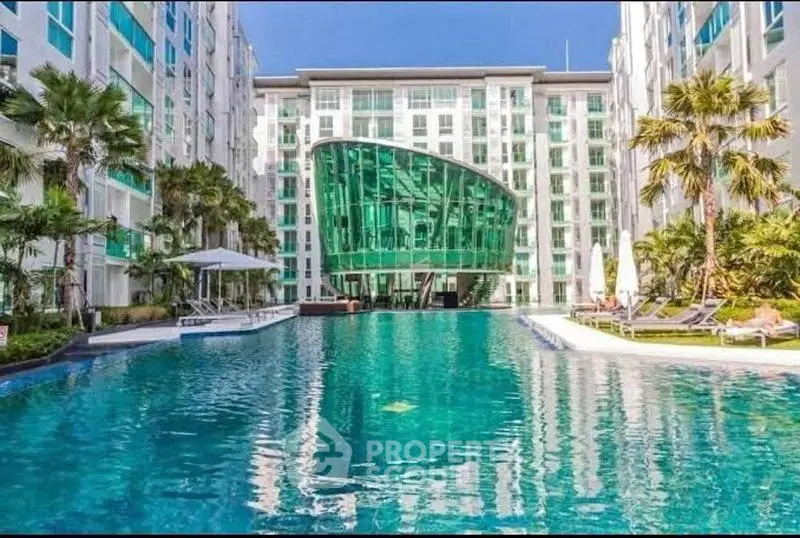 Luxurious condominium with stunning pool and modern architecture, perfect for resort-style living.