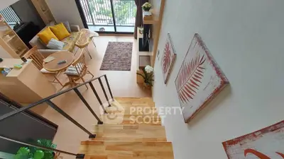 Modern duplex living room with wooden staircase and stylish decor