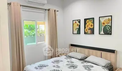 Cozy bedroom with modern decor and natural light