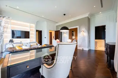 Luxurious living room with elegant decor and modern furnishings in a high-end apartment.
