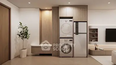 Modern living room with built-in laundry appliances and minimalist design.