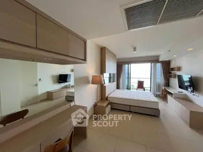 Modern bedroom with balcony and stylish furnishings in a bright apartment