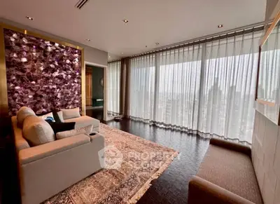 Luxurious living room with panoramic city view and elegant decor.