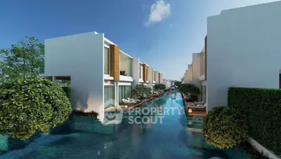 Luxurious waterfront villas with private pools and modern architecture in serene setting.