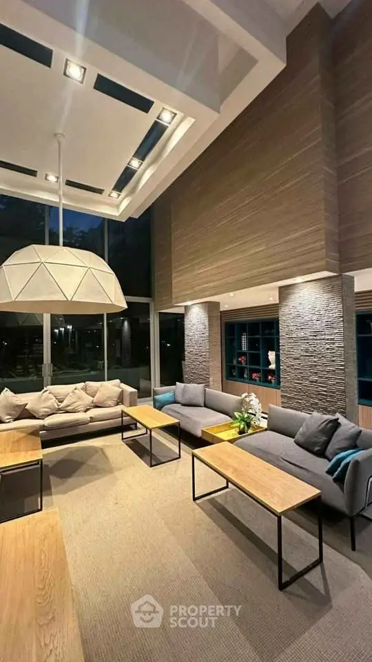Luxurious modern living room with high ceilings and elegant decor