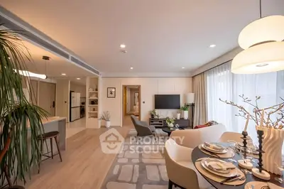 Spacious modern living room with open kitchen and elegant decor