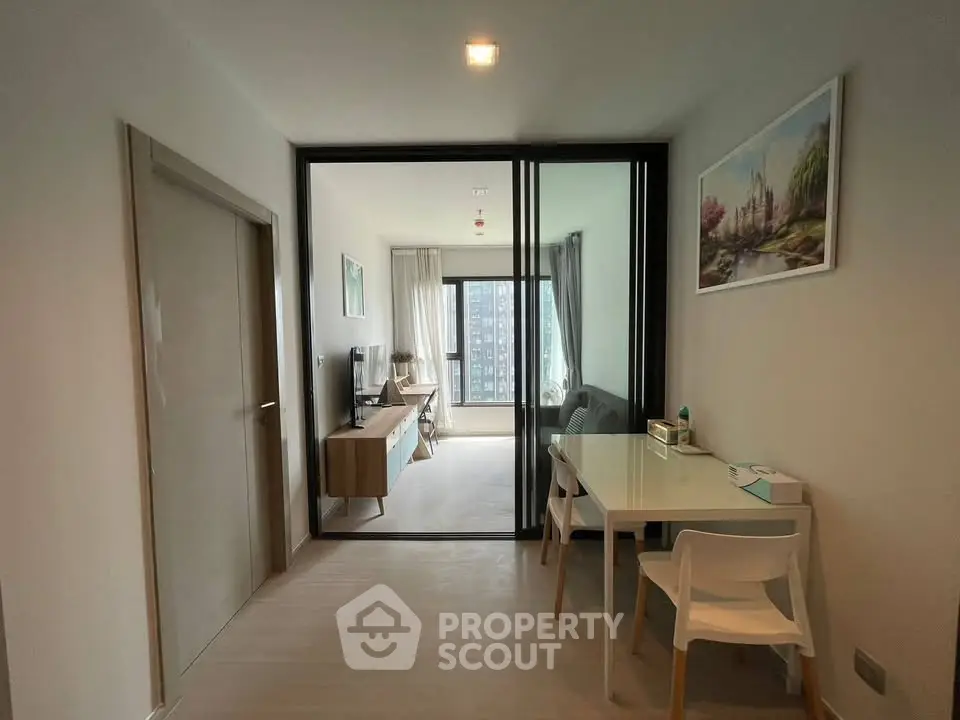 Modern apartment interior with glass partition and stylish decor