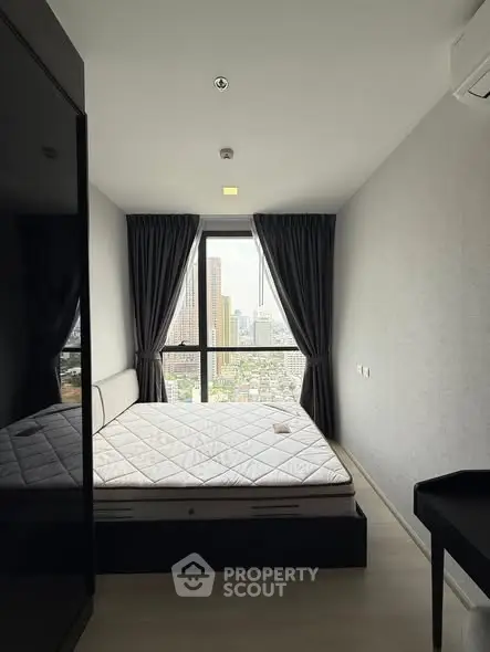 Modern bedroom with city view and minimalist design