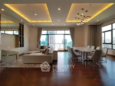 Luxurious modern living room with city view and elegant dining area