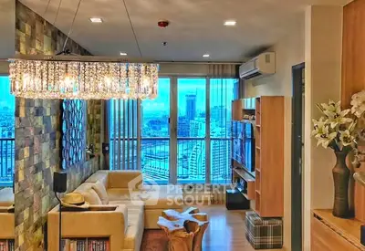 Luxurious living room with city view, elegant chandelier, and modern decor