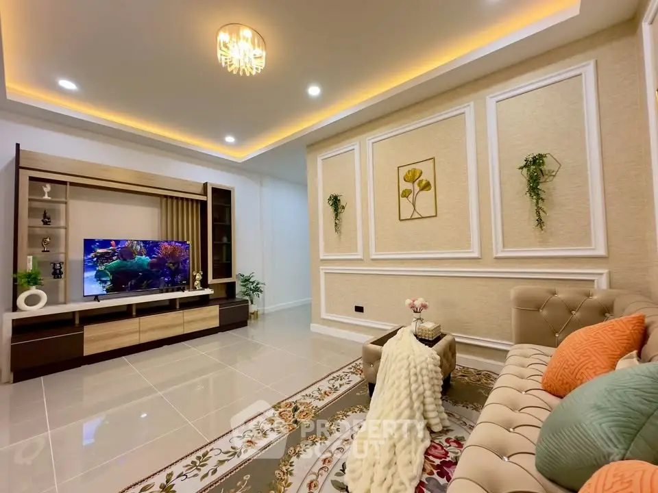 Luxurious living room with elegant decor, plush sofa, and modern entertainment center, perfect for relaxation.