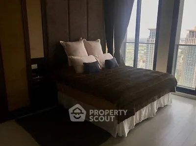 Luxurious bedroom with stunning city view and elegant decor