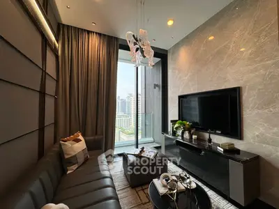 Luxurious living room with modern decor and city view, featuring elegant lighting and stylish furniture.