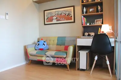 Charming study area with colorful sofa and modern desk setup