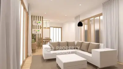 Modern living room with stylish white sectional sofa and elegant decor