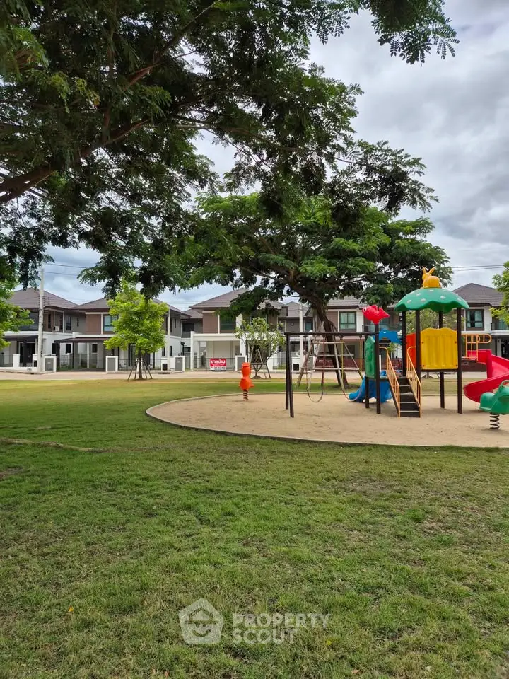 Charming residential neighborhood with modern homes and a vibrant playground, perfect for families seeking community living.