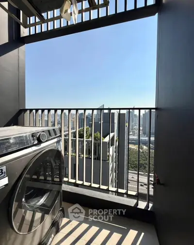 Modern balcony with washing machine and city view, perfect for urban living.
