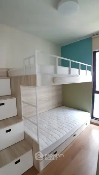 Modern bedroom with stylish bunk bed and natural light