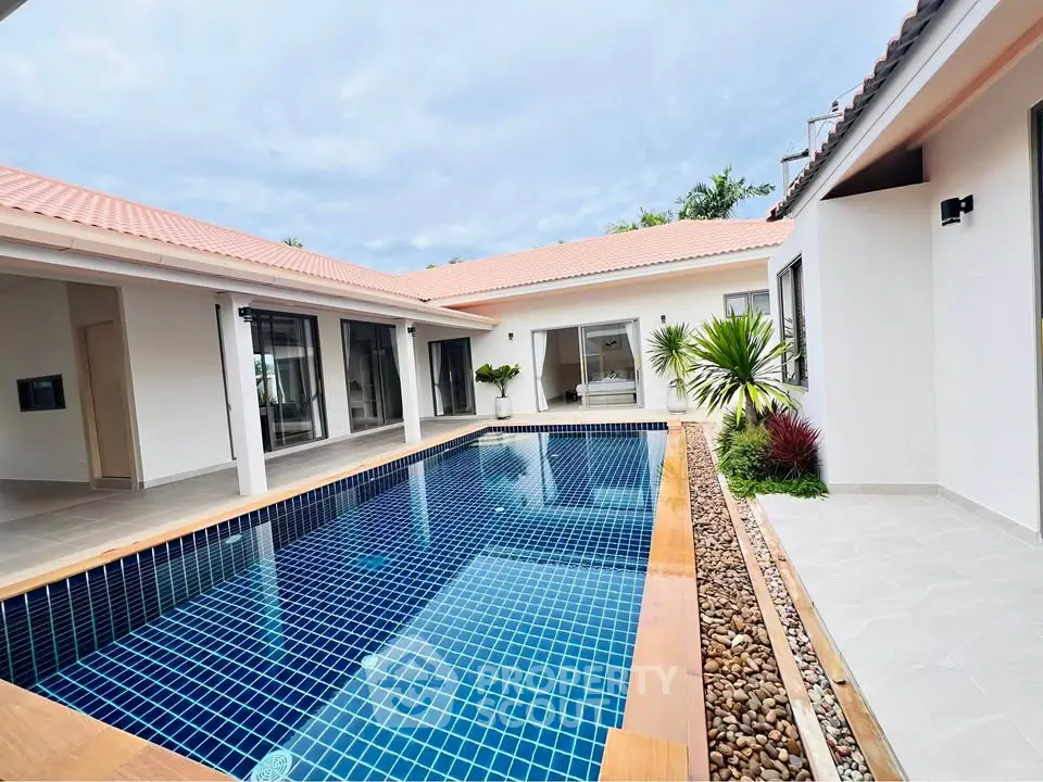 Luxurious modern villa with private pool and elegant design, perfect for serene living.