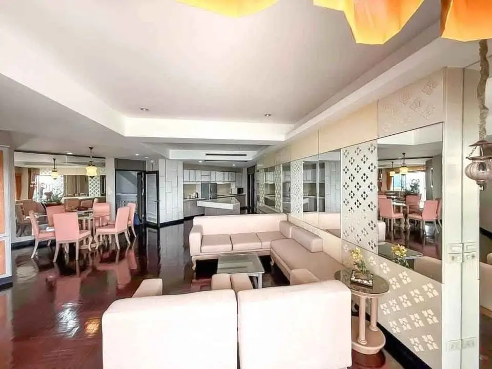 Spacious living room with elegant decor and open layout in luxury apartment