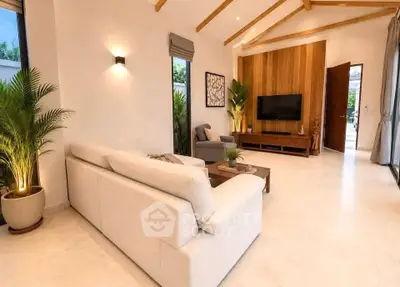 Spacious modern living room with high ceilings and elegant decor