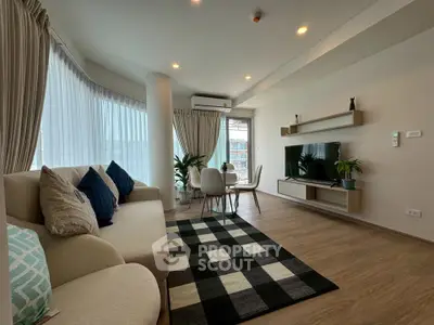 Modern living room with stylish decor and natural light