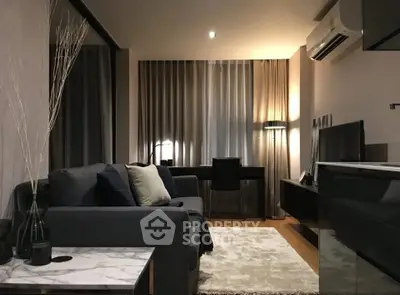 Modern living room with stylish decor and cozy ambiance, featuring a sleek sofa and elegant lighting.