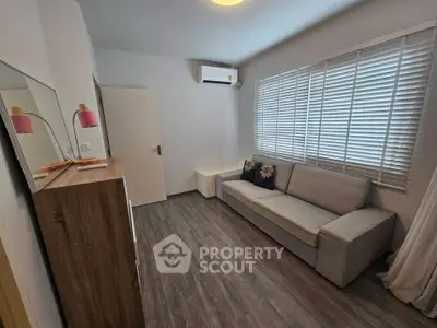 Cozy living room with modern decor and natural light