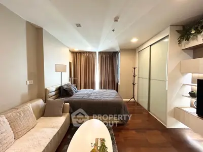 Modern bedroom with cozy decor and natural light